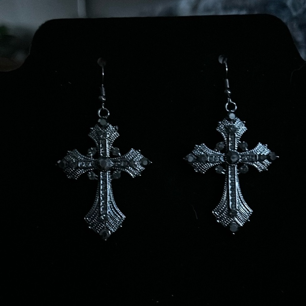 Gun mental rhinestone cross earrings.
